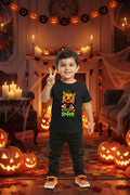 A black short-sleeve kids' t-shirt with a colorful graphic of a cute cartoon pumpkin character and the text 'TOO CUTE TO SPOOK' in orange and green.